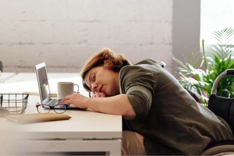 woman sleepy at the desk