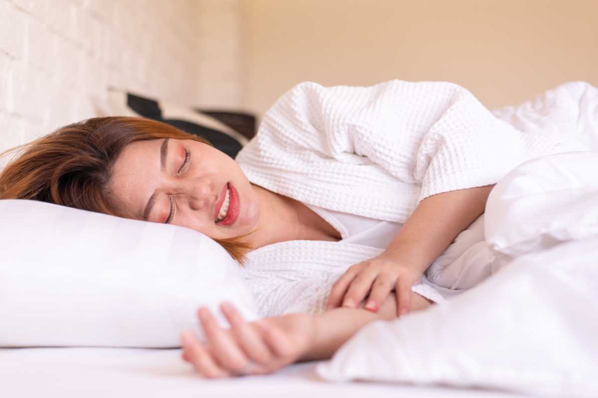 a girl teeth grinding while sleeping