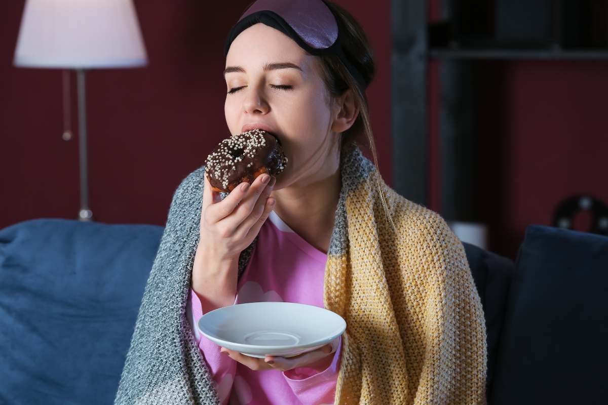 woman eating at night