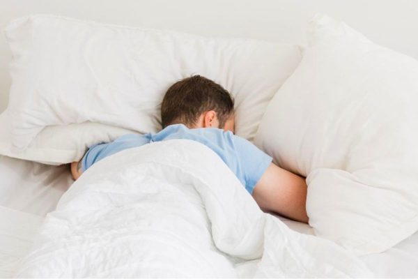 My father, sleeping peacefully on his fresh and clean bed.